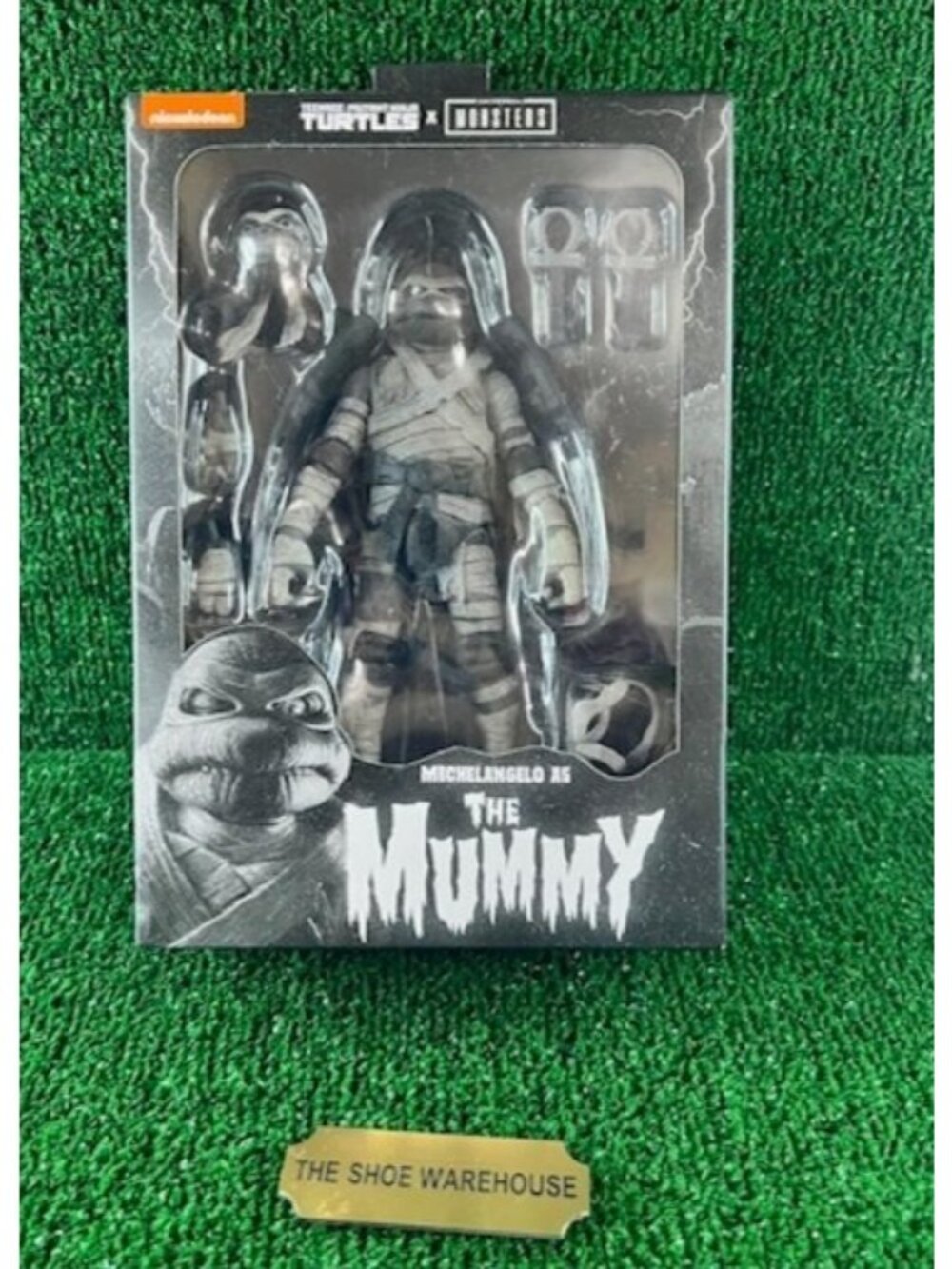 NECA TEENAGE MUTANT NINJA TURTLES X MONSTERS MICHELANGELO AS THE MUMMY NEW